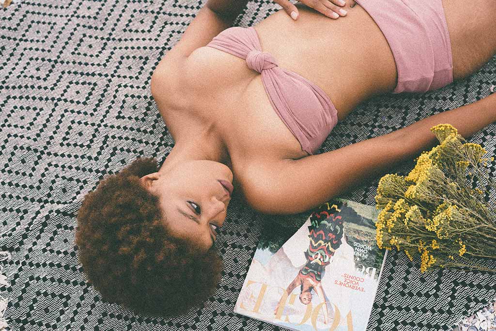 Woman lying on ground